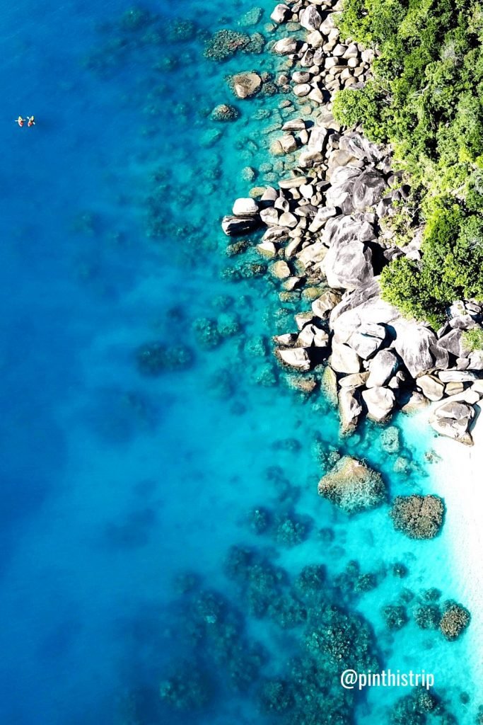 rocks at Nudey Beach, Fitzroy Island Cairns Australia drone shot